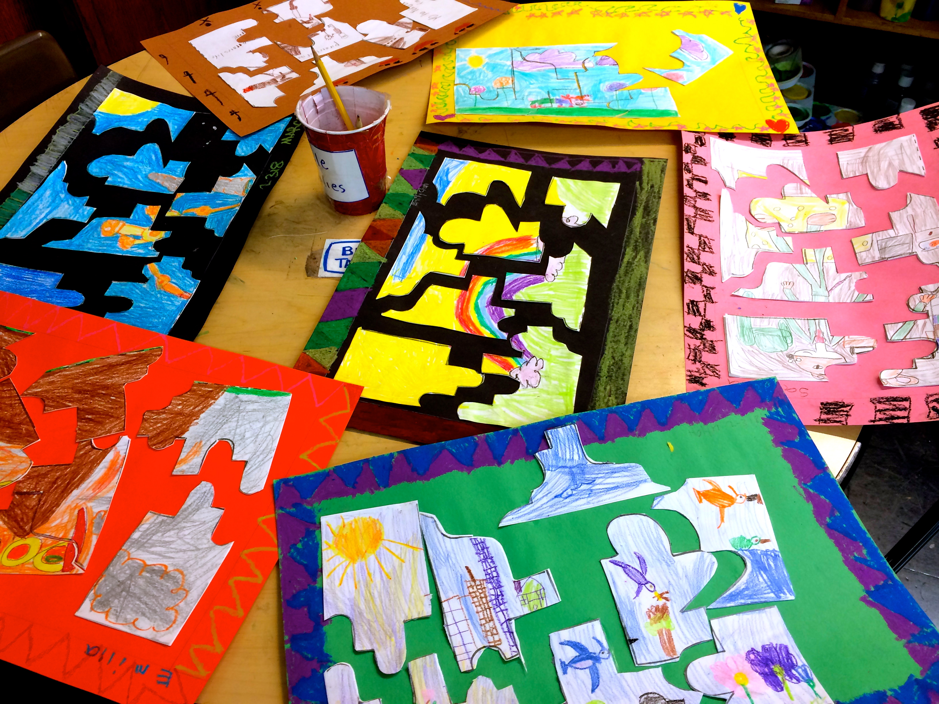 Puzzles. Mixed Media Collage, crayons on tagboard. (Grade 2)